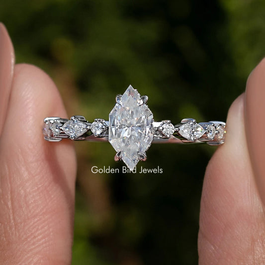 Sterling silver marquise moissanite accent ring with central marquise stone and side accents