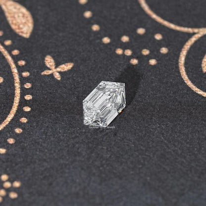 Square step-cut lab diamond, clear with sharp edges and bright facet flashes.