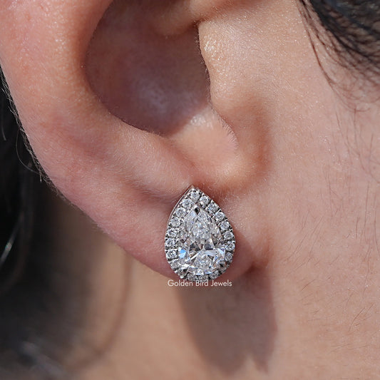 Close up view of Pear Lab Diamond Cut Halo Earrings