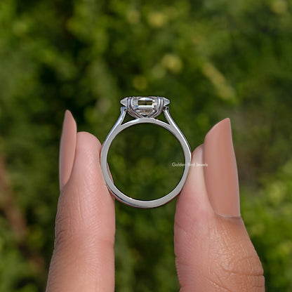 Marquise solitaire ring front view showing open prong setting and polished silver band