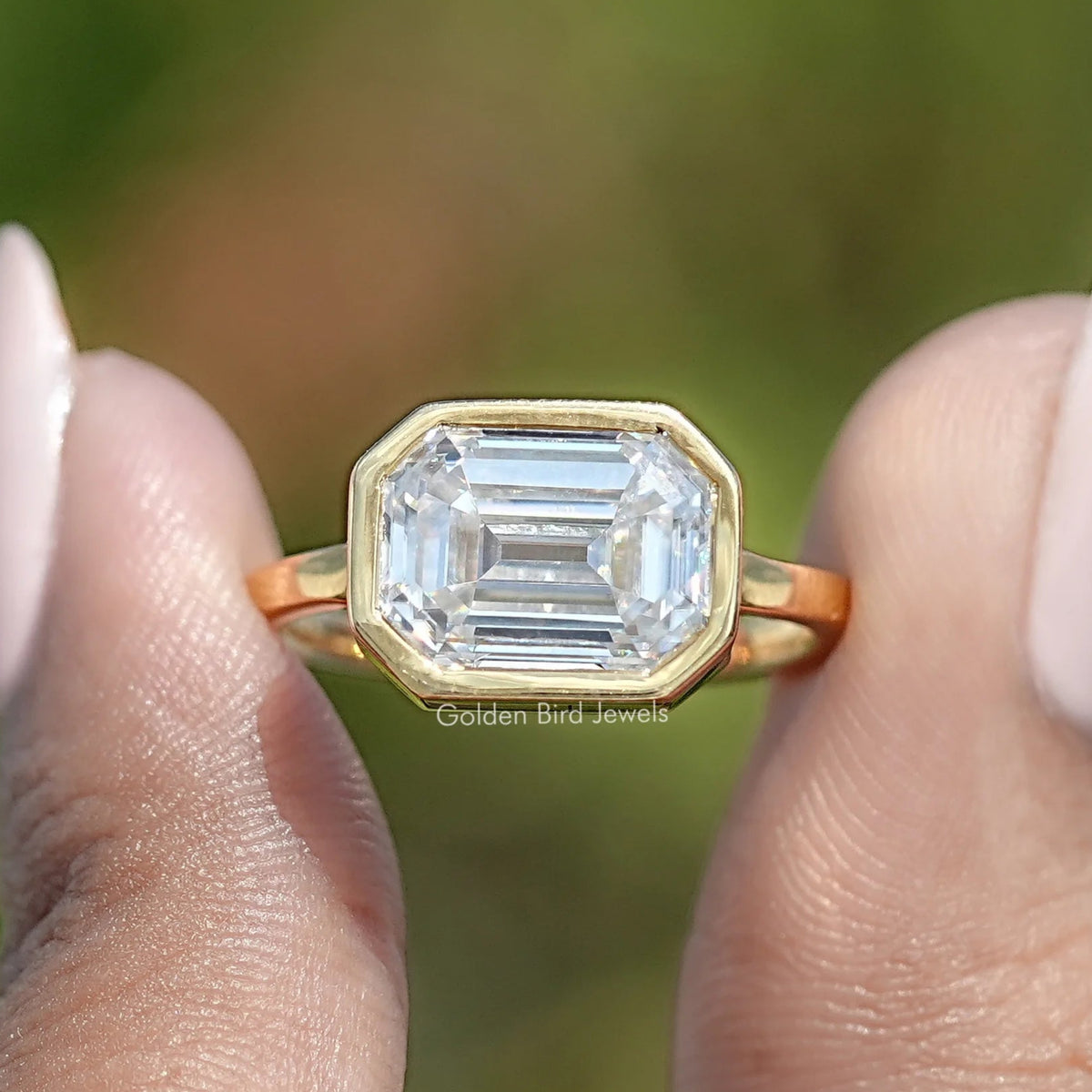 Front View of East West Old Mine Moissanite Emerald Cut Ring