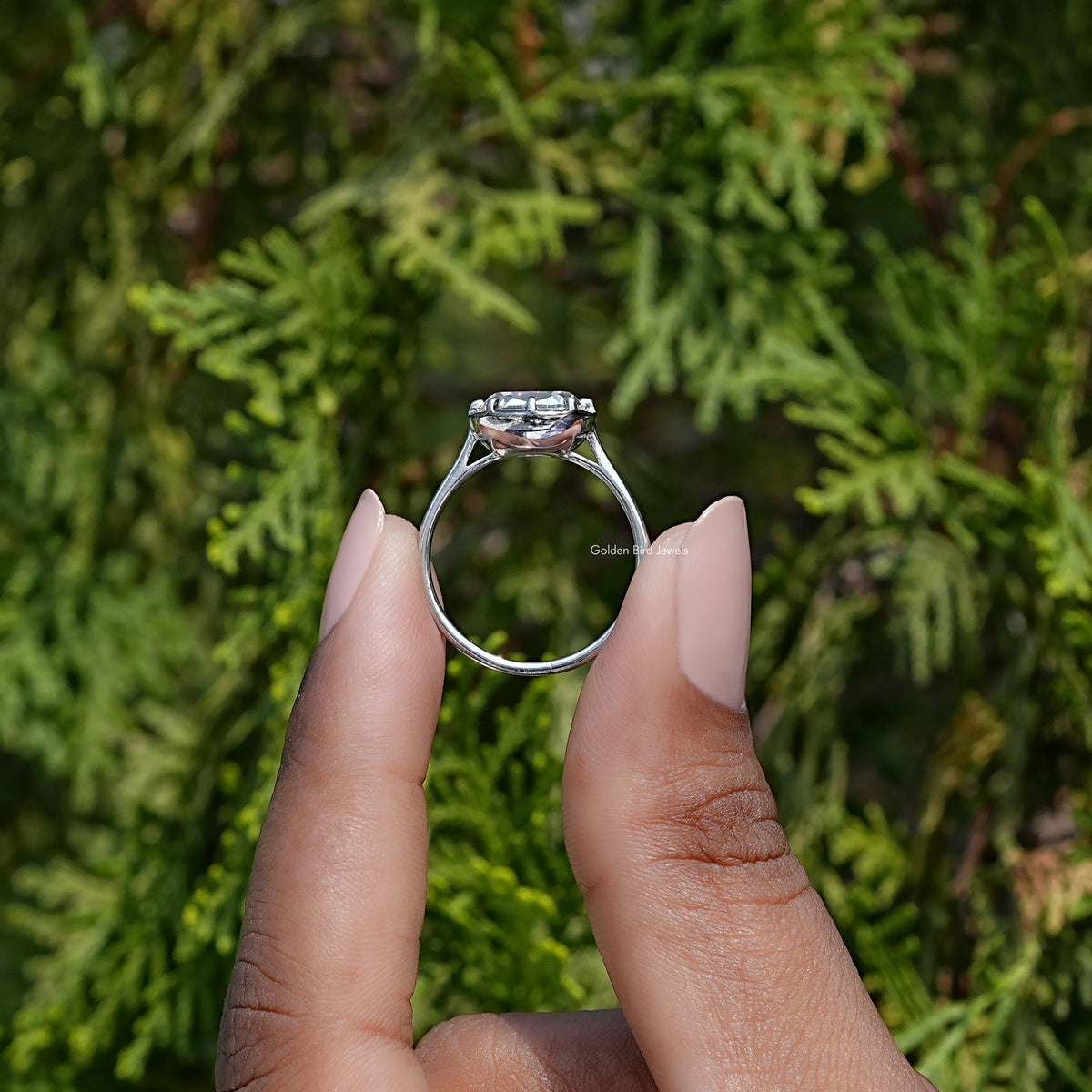 In Finger view of cushion cut moissanite halo Ring  
