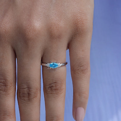 Profile View of Emerald Cut Gemstone Engagement Ring in white gold