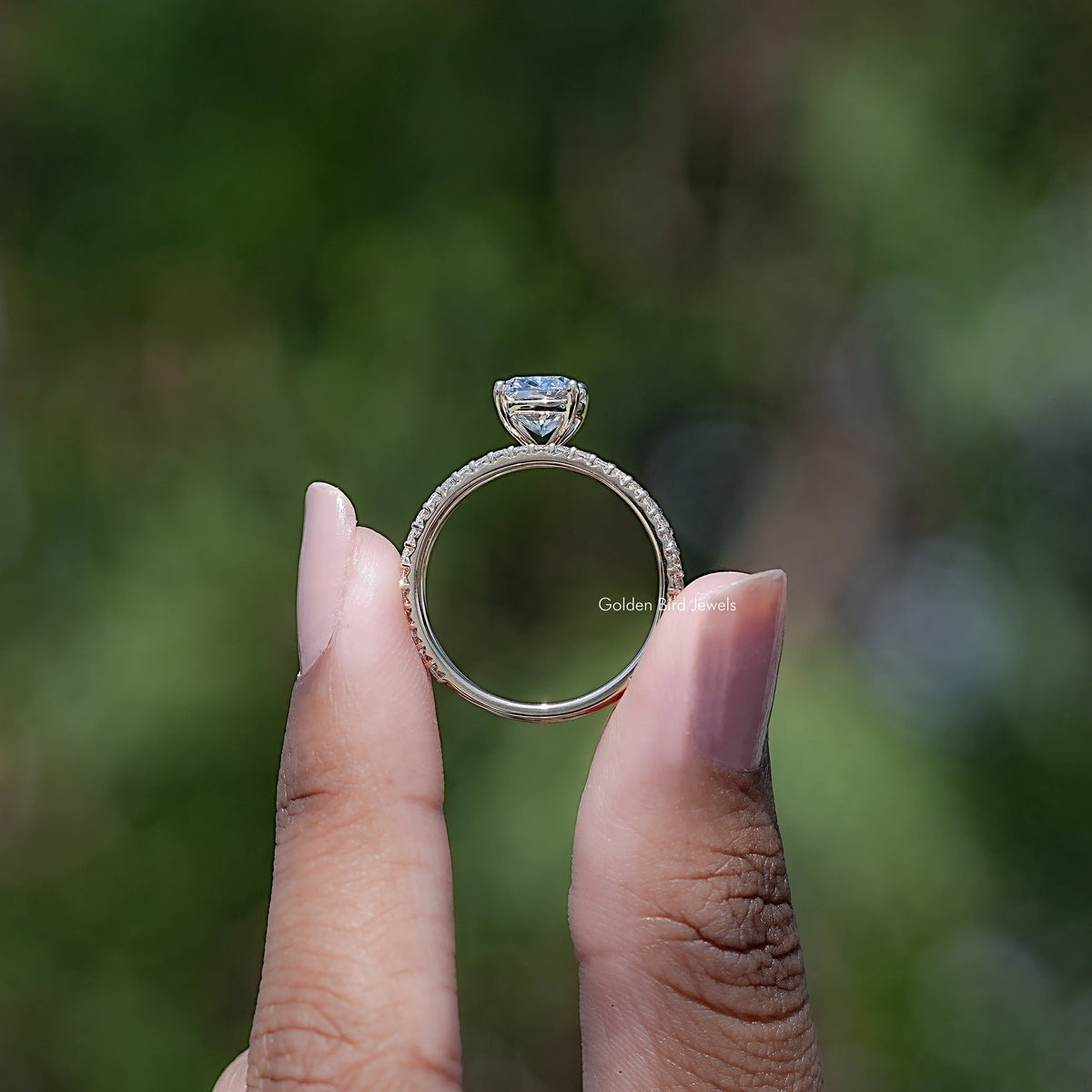 Elongated cushion cut lab grown diamond ring with pavé band, side view