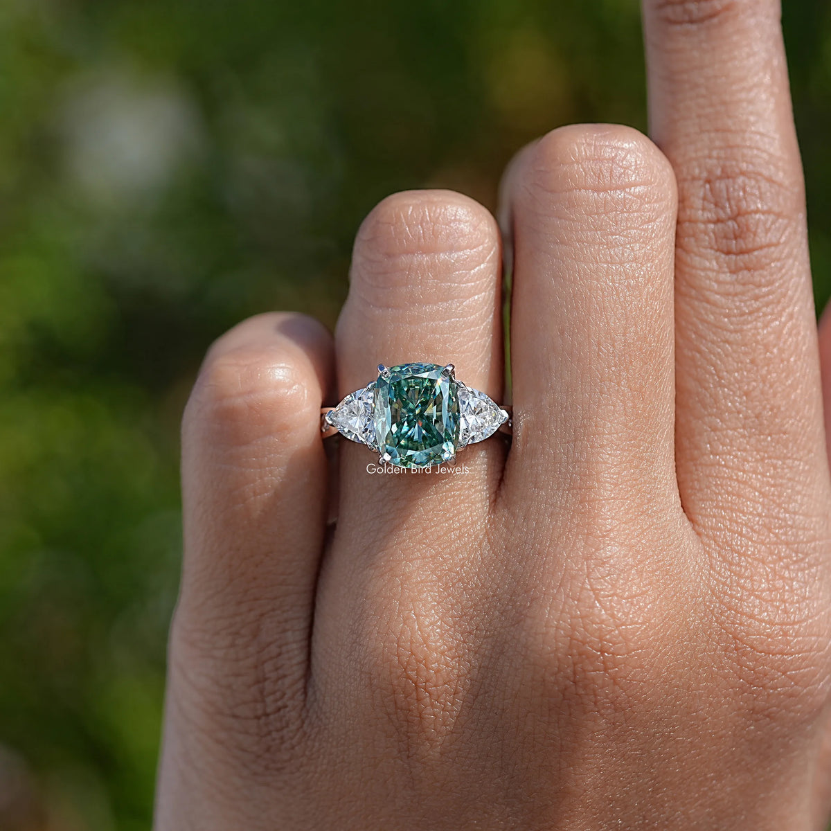 Top View Of Elongated Cushion Moissanite Three Stone Ring