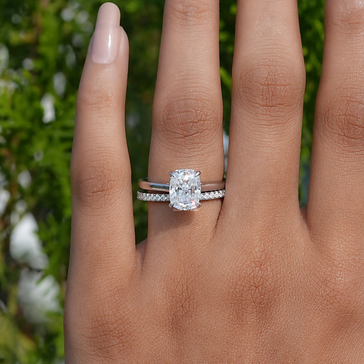Silver-tone bridal ring with elongated cushion moissanite and side pave band