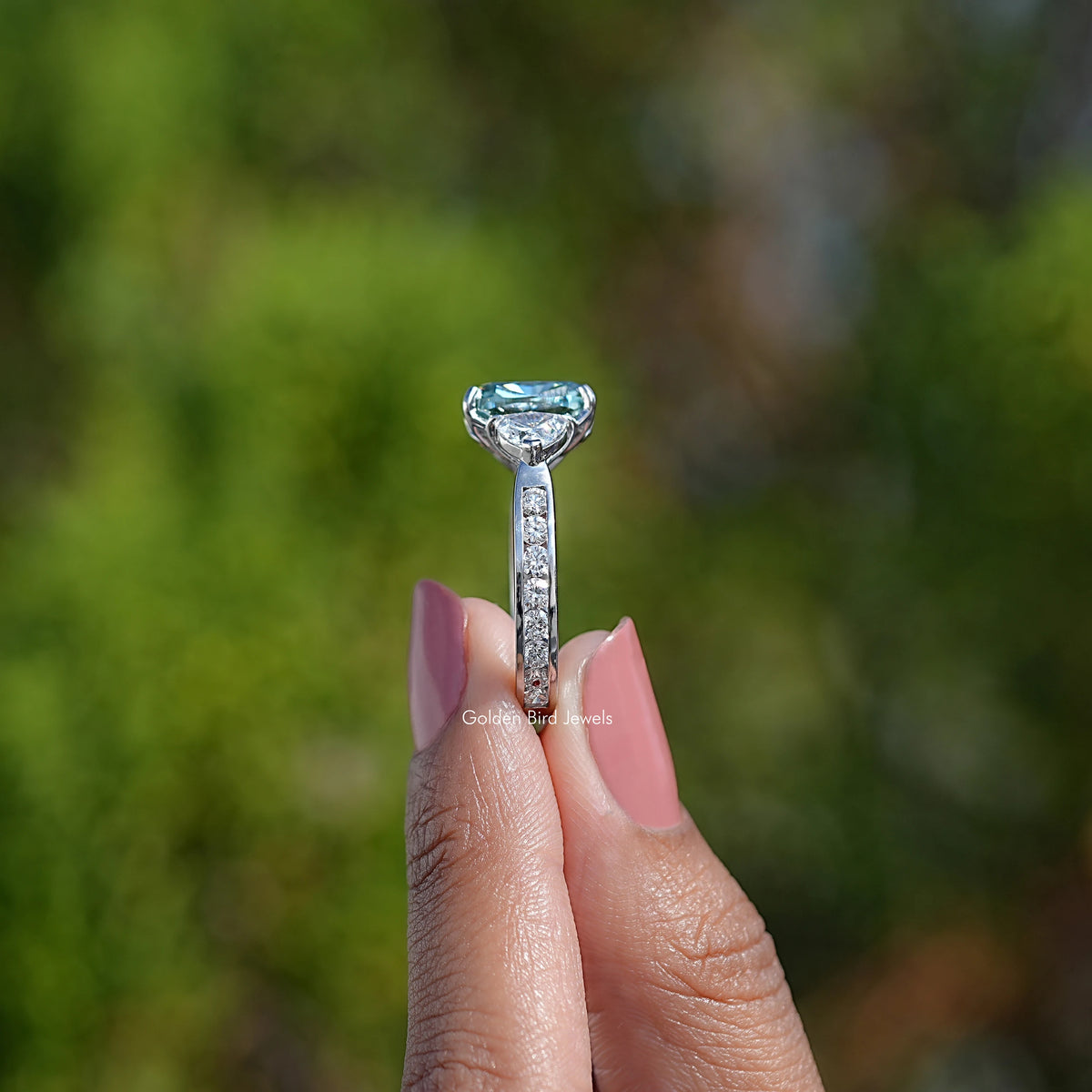 Argentium silver cushion-cut moissanite engagement ring, vertical side view