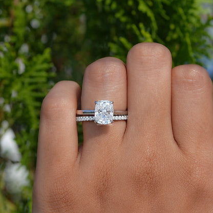 Elongated cushion moissanite ring with slim pave band and centered square stone