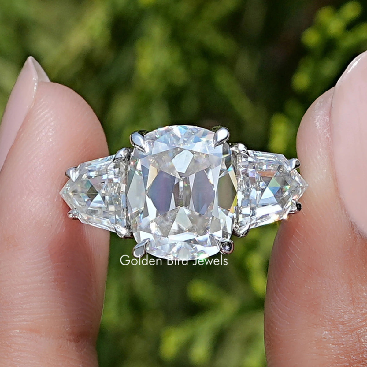 Front view of Elongated Old Mine Cushion Moissanite Three Stone Ring