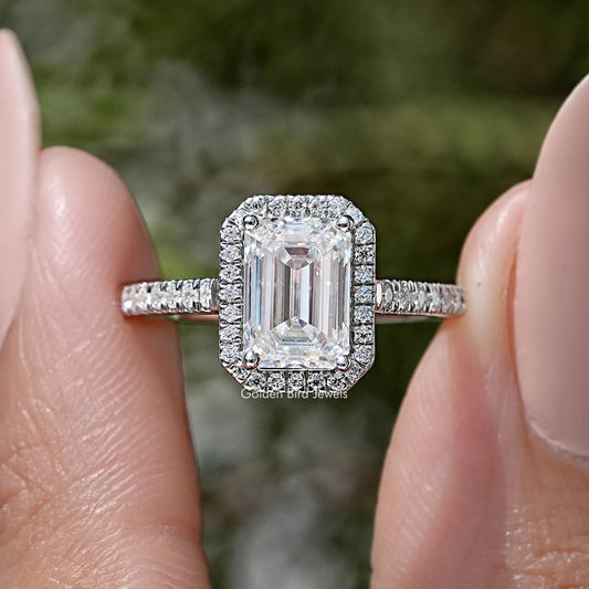 Emerald cut moissanite halo ring with pavé silver band