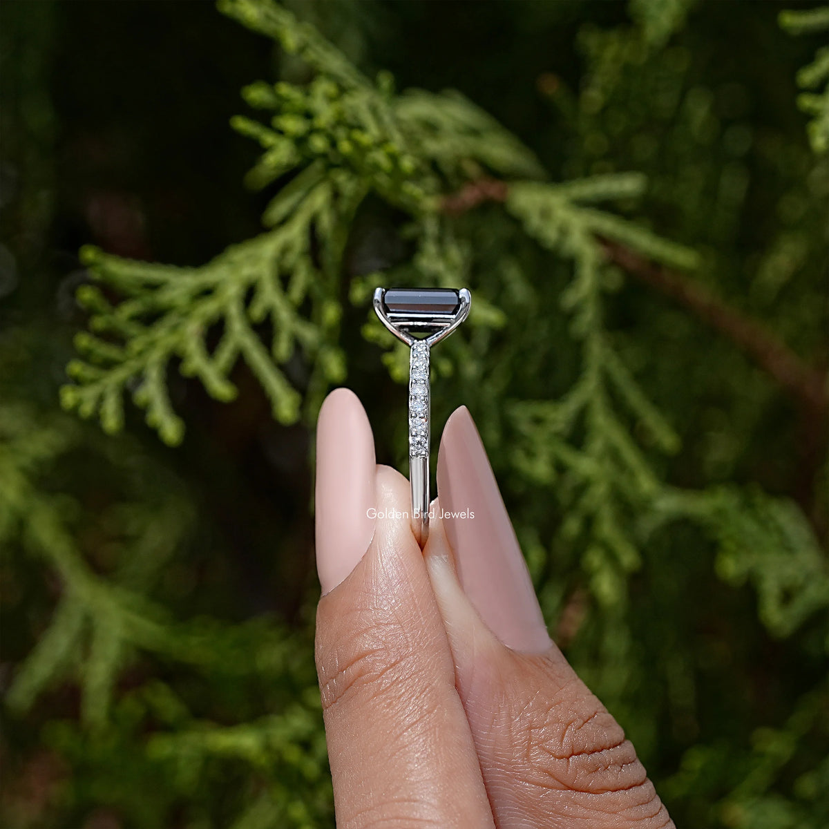 Black emerald-cut moissanite ring with slim silver pavé band