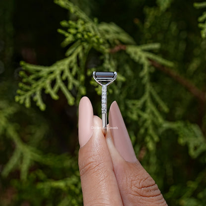 Black emerald-cut moissanite ring with slim silver pavé band