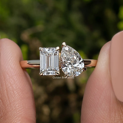Toi et moi solitaire ring with square and pear-cut clear stones, rose gold-tone band
