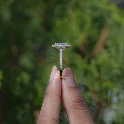 Emerald-cut halo moissanite engagement ring on prongs with split baguette band