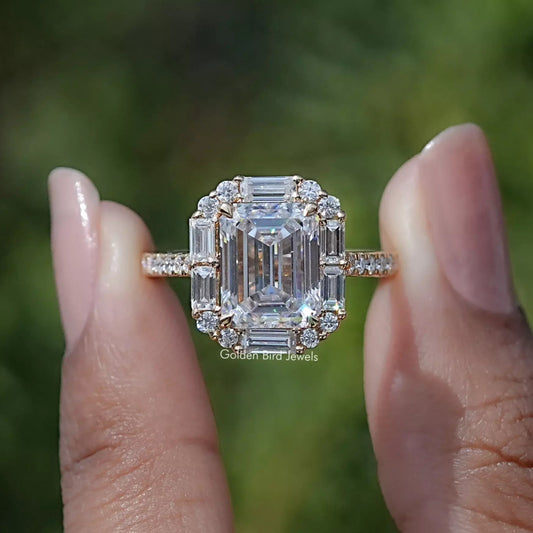 Emerald-cut halo moissanite engagement ring with baguette side stones, front view