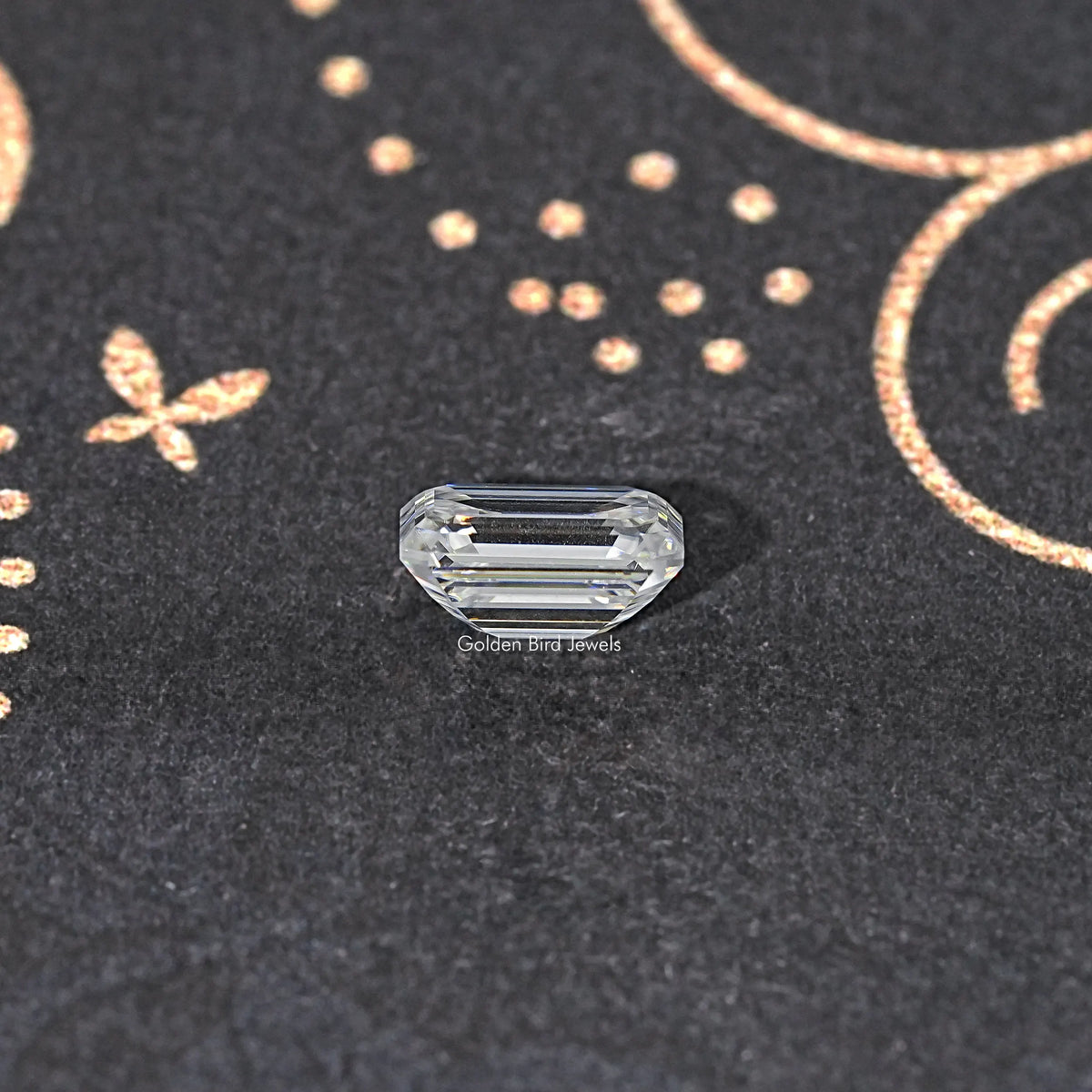Loose emerald-cut moissanite stone, clear, rectangular step outline