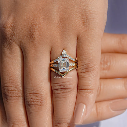 Three-stone bridal ring set with stacked curved bands and rectangular center stone