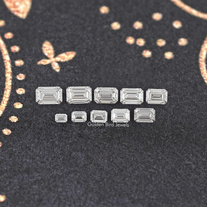 Loose emerald-cut lab-grown diamond set, shown in a neat row of stones