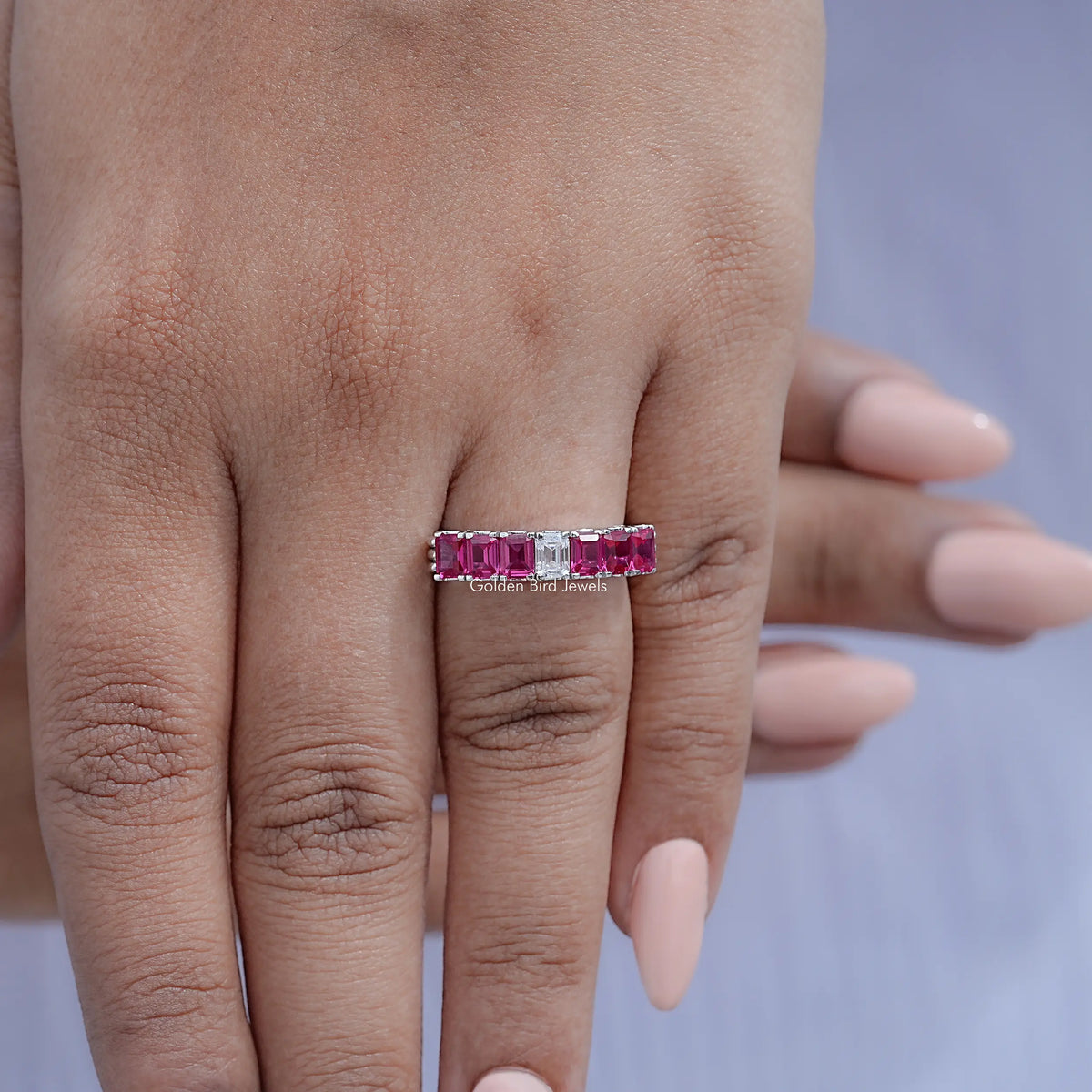 Detailed View Of Emerald Gemstone Seven Stone Band
