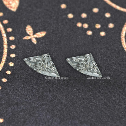 Pair of faceted marquise-shaped lab-grown diamonds, clear icy gray sparkle