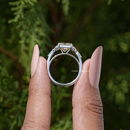Princess-cut moissanite ring, front view on fingers with rectangular center stone and stones