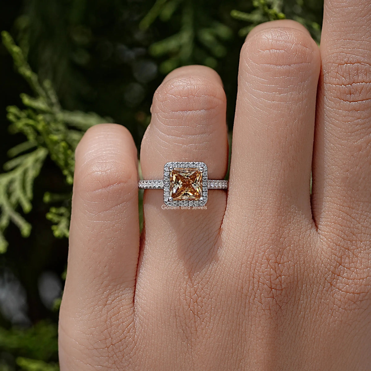 Princess-cut moissanite ring in sterling silver with square halo center