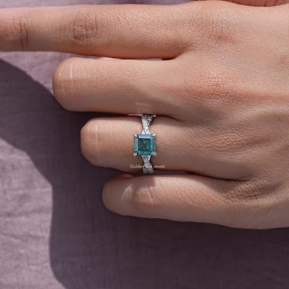 Asscher-cut moissanite ring with twisted silver accent band