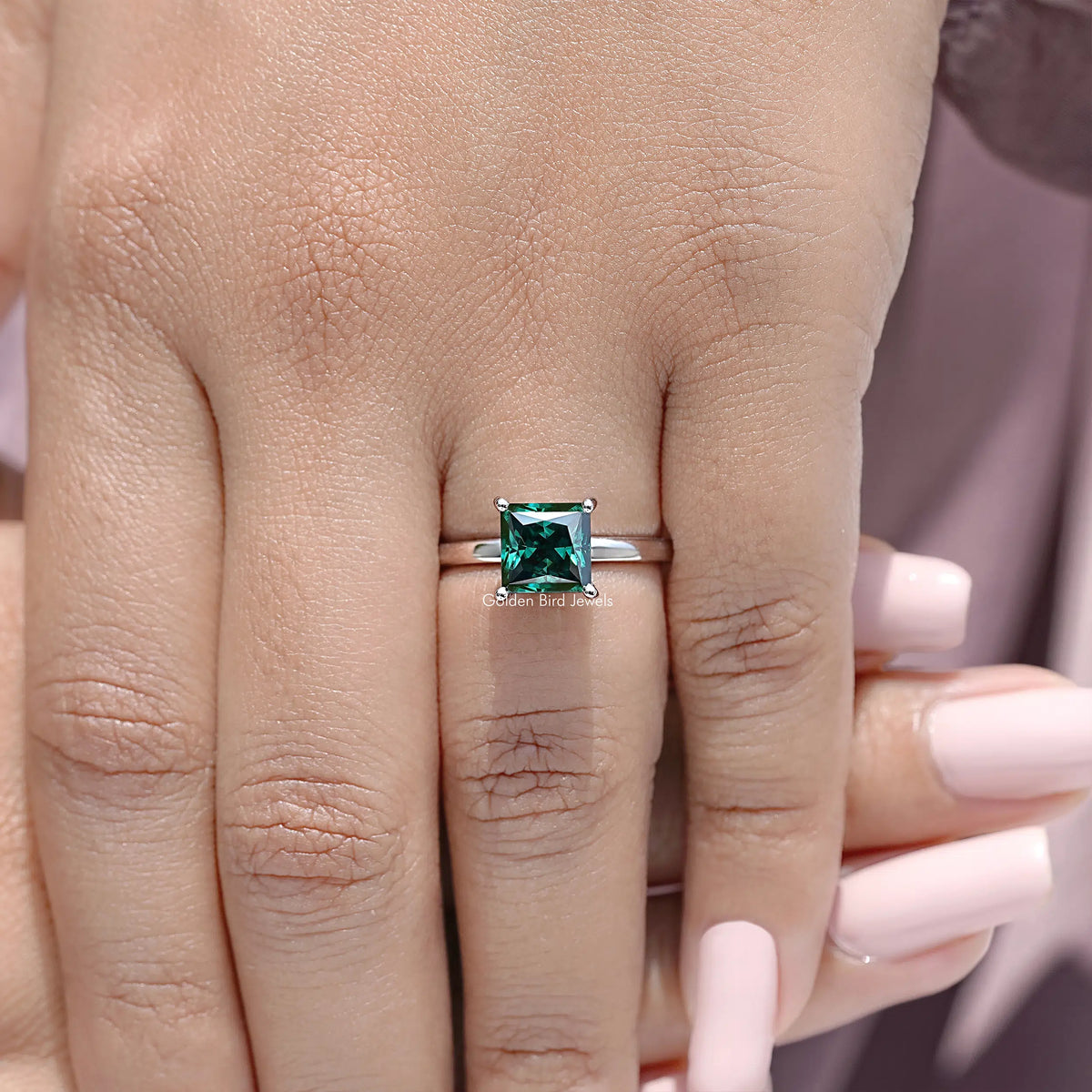 Square emerald-green moissanite ring on 925 sterling silver band, hidden halo setting