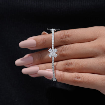 Pear-cut lab diamond flower bangle bracelet on hand