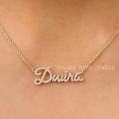 Personalized script name pendant necklace with round-cut stone detailing on gold chain
