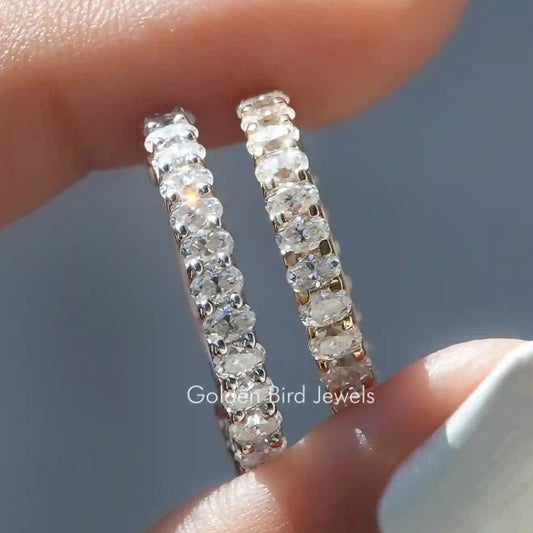 Silver oval-cut moissanite eternity wedding band with channel-set stones