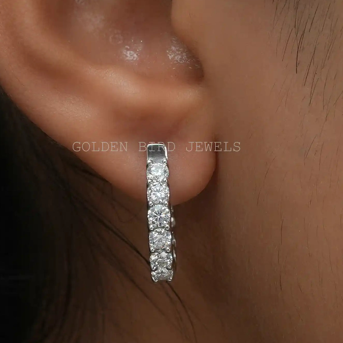 Round moissanite huggie hoop earring in silver
