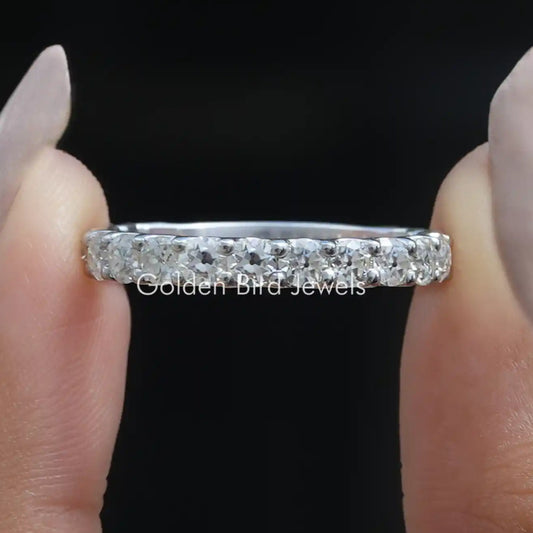 Moissanite 3/4 eternity band ring with a full row of round stones, straight-on view