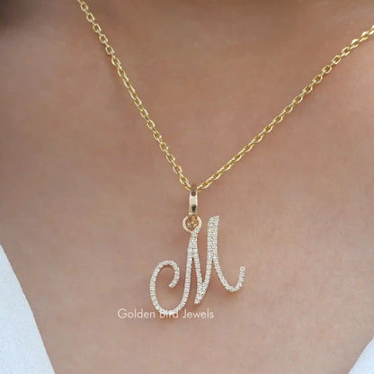 Custom letter pendant with round moissanite stones, on a gold-tone chain