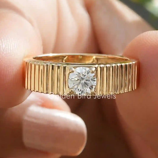 Gold-tone round solitaire ring with ribbed band and clear round center stone