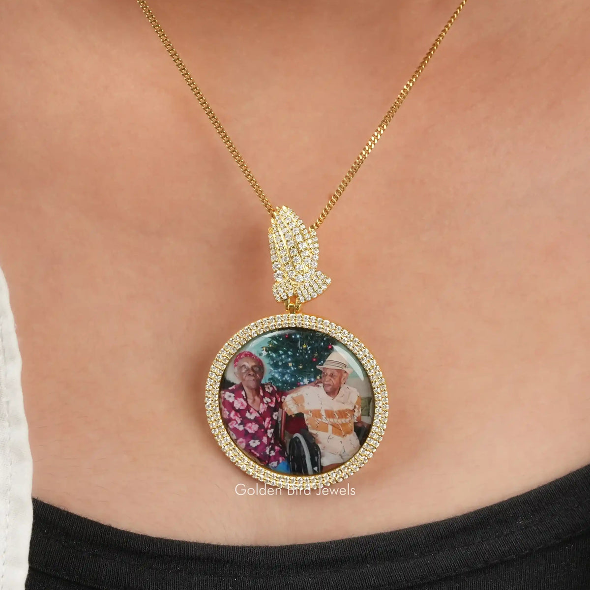 Gold-tone round photo pendant necklace with sparkling halo and oval photo centerpiece