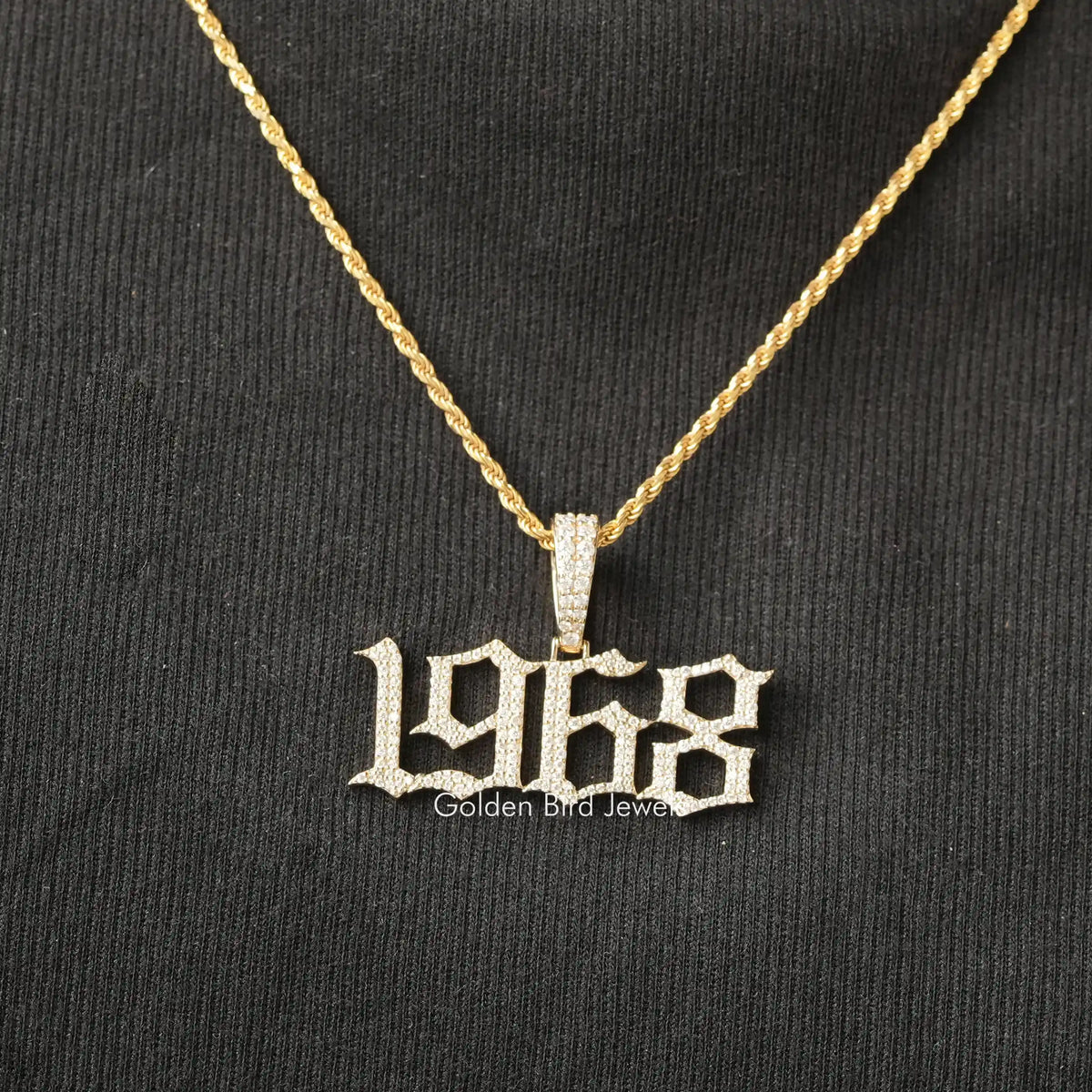 Gold-tone hip hop pendant with clear round stones, on chain