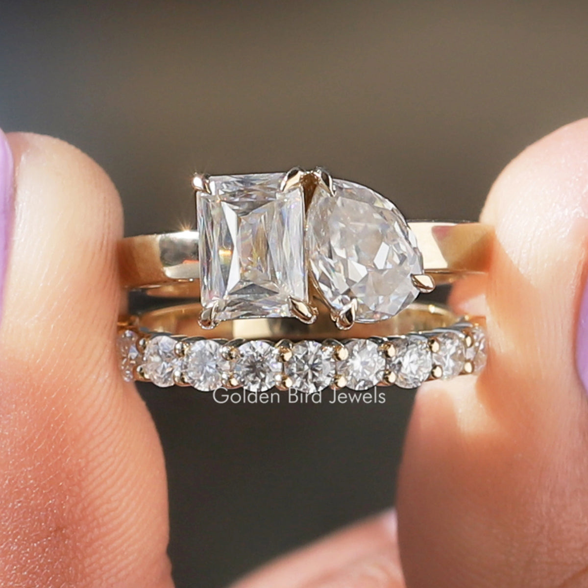 Silver ring with faceted pear and criss-cut stones, plus pave matching band