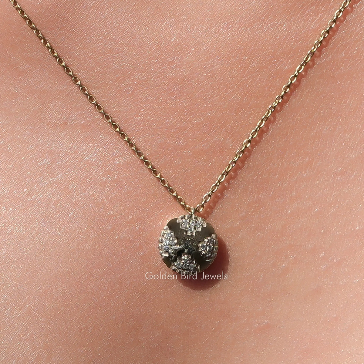 Round moissanite cluster pendant with shimmering stones on a fine chain