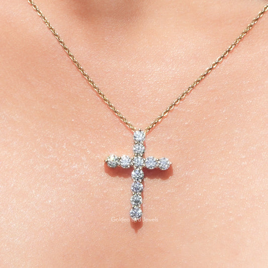 Moissanite cross pendant with round-cut stones on delicate chain