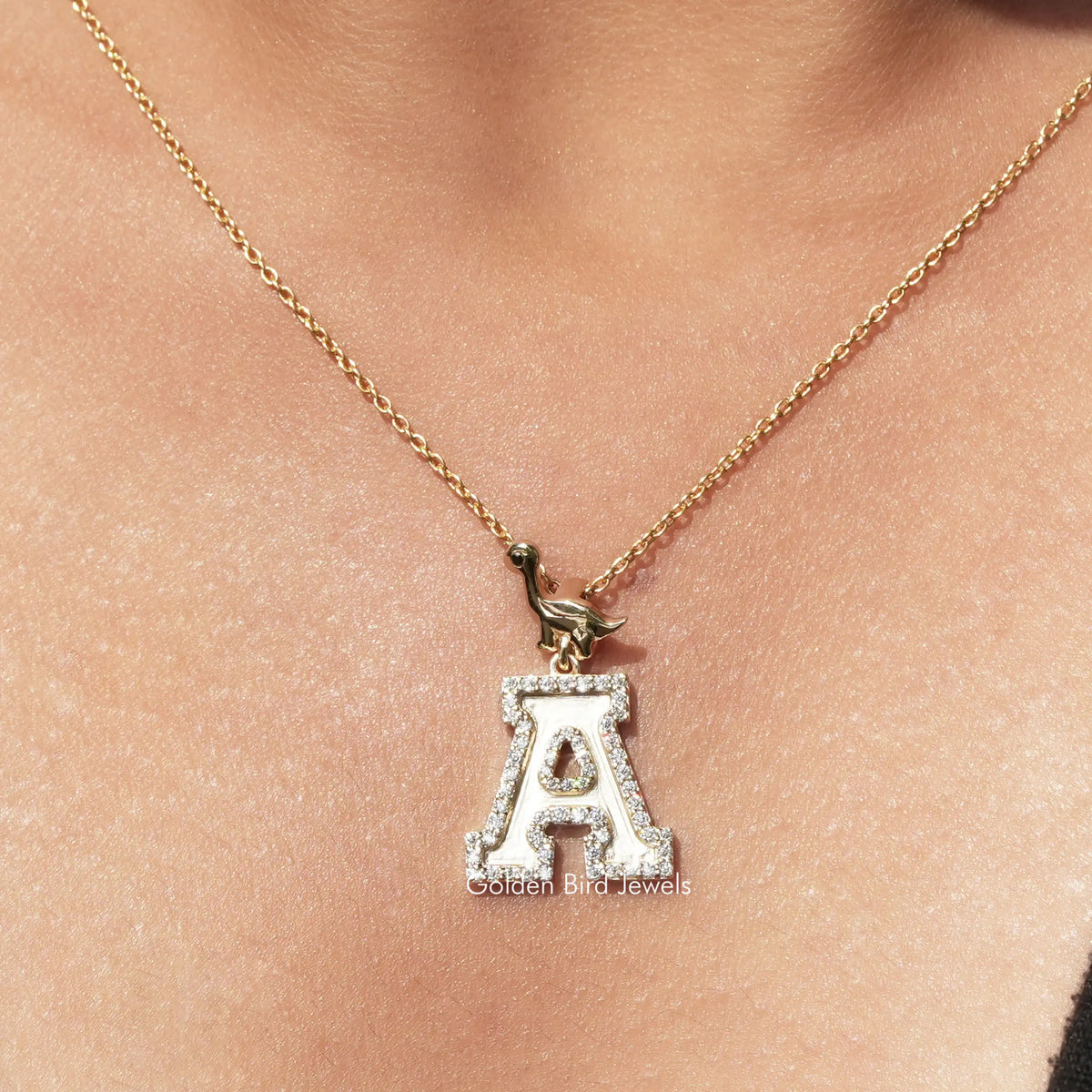 Initial A moissanite pendant with square frame, on gold-tone chain