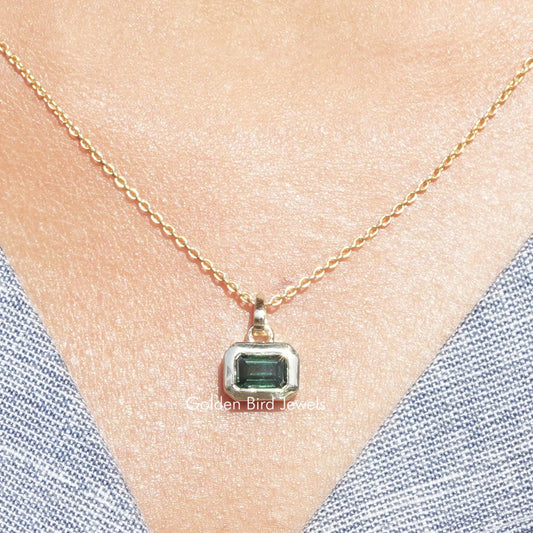 Green emerald-cut solitaire pendant with square moissanite on gold-tone chain