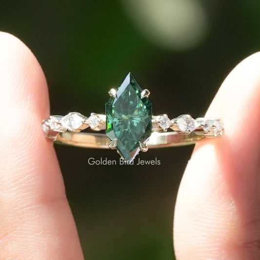 Green marquise moissanite hidden halo ring with small round side stones, silver setting
