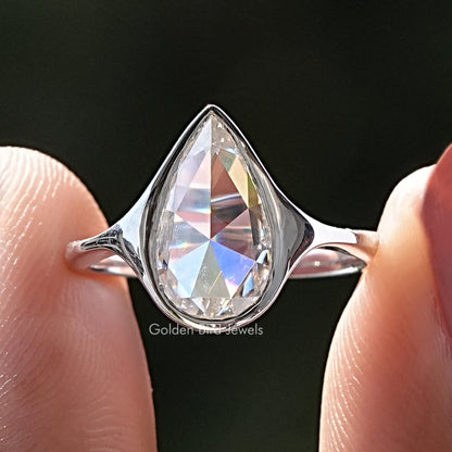 Silver-tone pear moissanite bezel set ring with open band