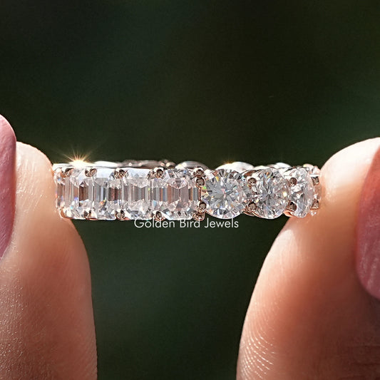 Close-up of continuous moissanite round stones in prong-set metal band