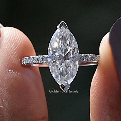Marquise cut moissanite engagement ring with pavé band