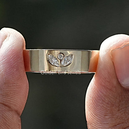 Silver flush-set men's ring with marquise-cut stones and small round accents