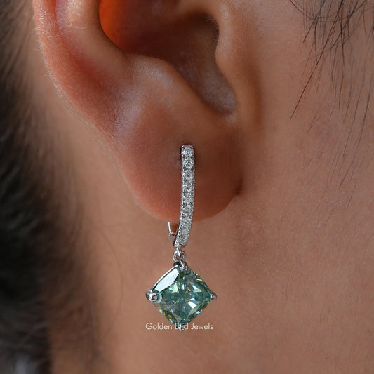 Moissanite drop earring with cushion-cut blue green stone and pavé hoop