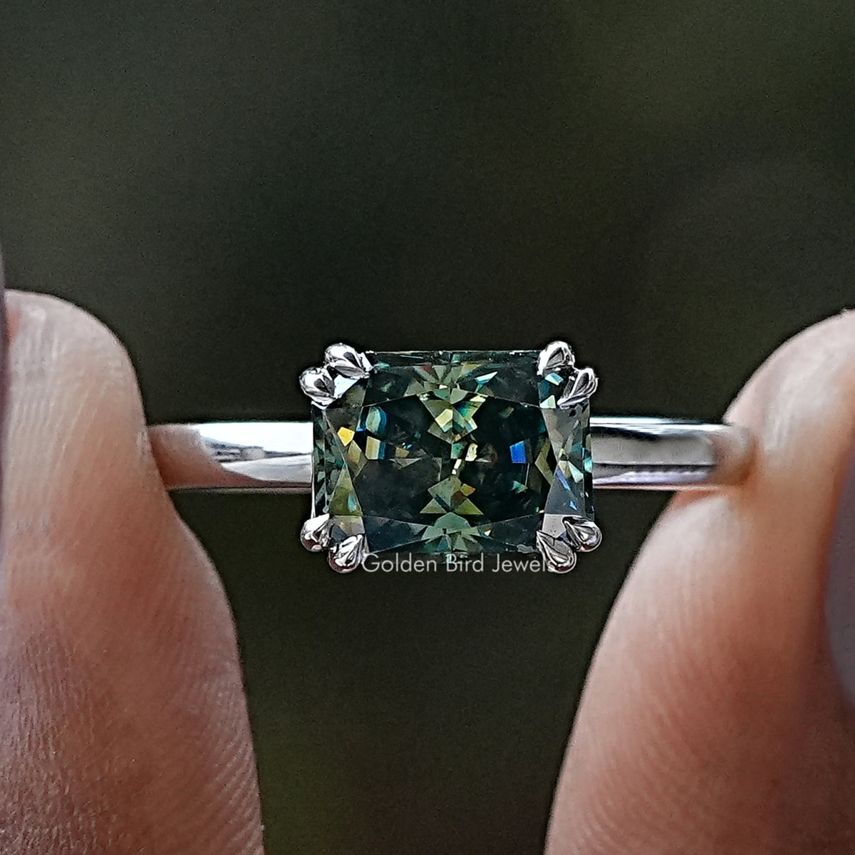 Square moissanite engagement ring in silver with four-prong setting