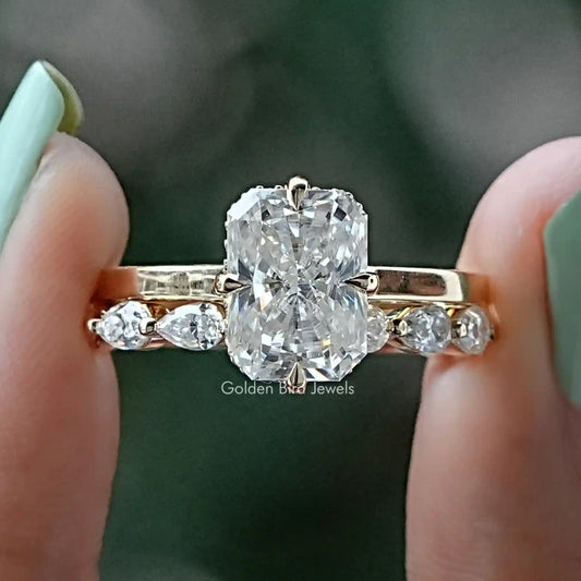 Silver-tone moissanite ring set with large radiant-cut center stone and side stones